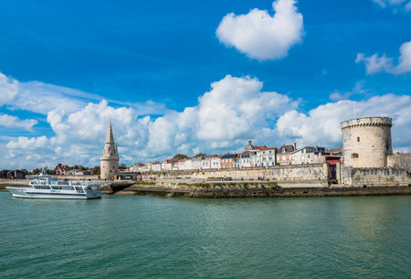 FRANCE, LA ROCHELLE - SEPTEMBER 21, 2015: View of Old Harbour towers of La Rochelle France ancient fortress.のeditorial素材
