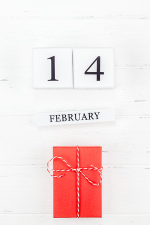 Creative Valentine Day romantic composition flat lay top view love holiday celebration red heart calendar date white wooden background copy space Template greeting card text design social media blogsの写真素材