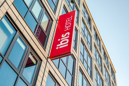 MUNICH, GERMANY - DECEMBER 26, 2018: Ibis logo at hotel building located in Munich, Germanyのeditorial素材
