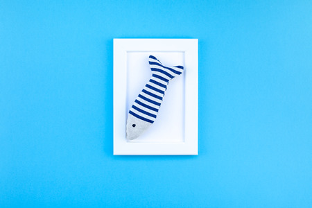 Creative flat lay concept of summer travel vacations. Top view of seashells and starfish on...