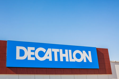 SAGUNTO, SPAIN - FEBRUARY 08, 2019: Decathlon store is a French company of sporting goods distribution retail chain brand logo at building located in Sagunto shopping area Spain. Blue sky backgroundのeditorial素材