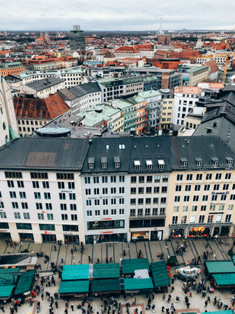 MUNICH, GERMANY - DECEMBER 23, 2018: Christmas market Christkindlmarkt on square Marienplatz in Munich. Aerial view from Rathaus Turm tower. Mobile photographyのeditorial素材