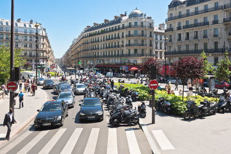 FRANCE, PARIS - JUNE 04, 2015: Car road traffic on the street of Paris during summerのeditorial素材