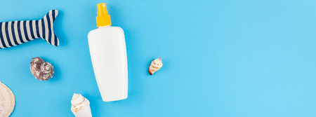Creative flat lay concept of summer travel vacations. Top view of seashells and starfish on...