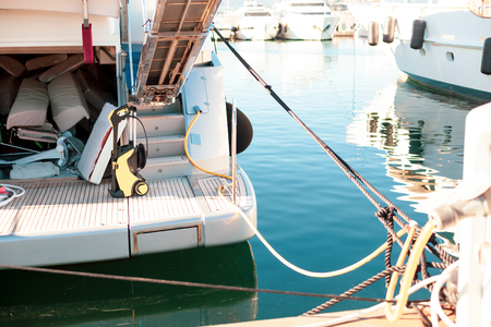 Cleaning service on yacht in Marina of Cannes, French Riviera, Franceの写真素材