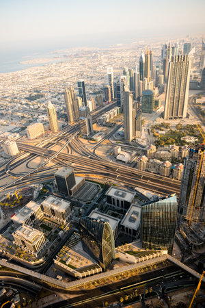 DUBAI, UAE - JANUARY 02, 2015: Dubai downtown sunrise morning scene. Top view from aboveのeditorial素材