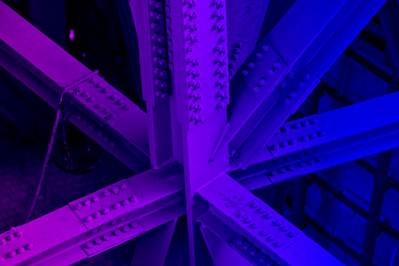 Bridge frame closeup neon colored. Horizontal purple and blue glowing toned imageの写真素材