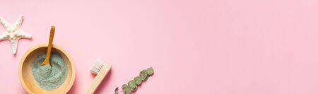 Spa, beauty cosmetics and body care treatment concept with copy space. Creative top view flat lay composition with bath accessories on pink backgroundの写真素材