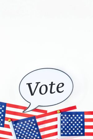 Creative top view flat lay of American flags for Elections Memorial Day 4th of July or Labour Day with bubble lightbox copy space white background minimal style. Concept of patriotism and independenceの写真素材