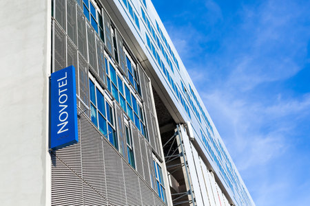 Novotel logo at hotel building located in Lyon, France on bright blue sky background with copy space. Lyon, France - February 21, 2020のeditorial素材