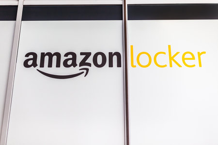 Amazon Locker in shopping mall, brand logo on pick up point for mail order goods. Lyon, France -...