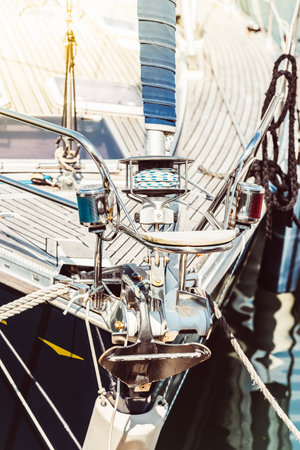 Sailboat deck close-up with ropes and metal fixtures, nautical concept background,の写真素材