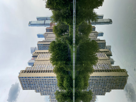 Urban cityscape reflection creating an abstract symmetrical visual backgroundの写真素材