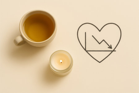 Tea cup with candle and heart-shaped falling graph symbol, flatlay concept, AI generatedの素材