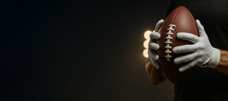 American football player holding ball with gloves against dark background, AI Generatedの素材