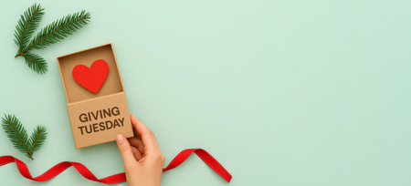 Giving Tuesday charity concept with heart, ribbon, and greenery on pastel background, AI Generatedの素材