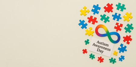 Autism Awareness Day colorful puzzle concept on light background, AI Generatedの素材