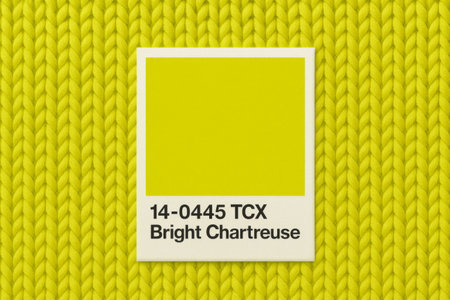 Chartreuse color sample on knitted texture background, AI Generatedの素材