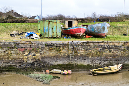 An isolated abandoned and dilapidated fishing boatのeditorial素材