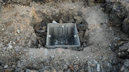 concrete square block prepare for make foundation pile. Building house in construction site....