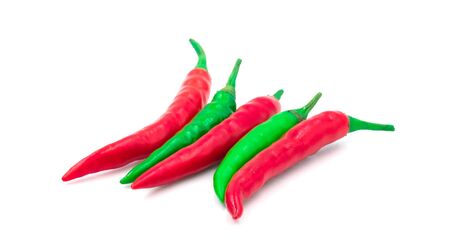 group of chilli green and red hot spicy vegetable. Alternate colors ingredient food. Isolated on white backgroundの写真素材