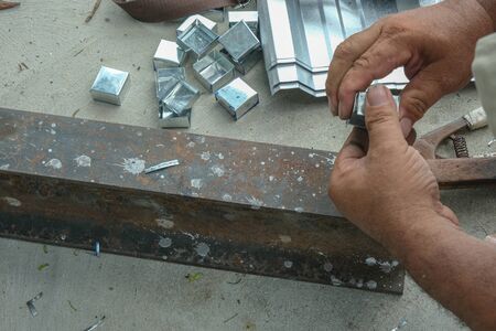 worker man use hand make shape bending aluminium .の写真素材