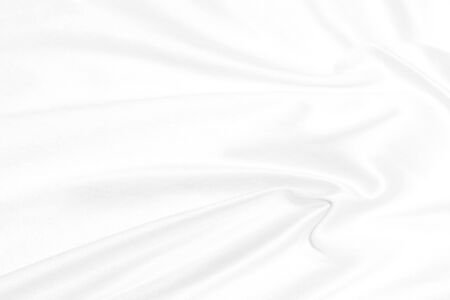 abstract white linen fabric curve shape backgroundの写真素材