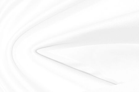 Soft clean linen fabric twirl motion wave curve abstract modern fashion style shape cloth textile white backgroundの写真素材
