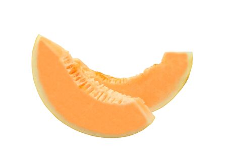 fresh honeydew melon fruit two pieces slice. Isolated on white backgroundの写真素材
