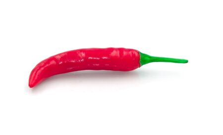 Single fresh red hot chilli spicy vegetable. Isolated on white background.の写真素材