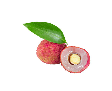 fresh two red lychee sweet fruit open peel and cut half show seed green leaf. Isolated on white backgroundの写真素材
