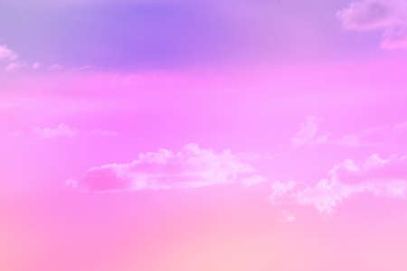 beauty abstract sweet pastel soft pink with fluffy clouds on sky. multi color rainbow image. fantasy growing lightの写真素材