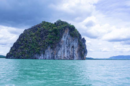 Beauty Samed Nang Chee island  in Thailand.high green tree on criff. Beautiful scenery ocean. Phang nga vacation destination.の写真素材