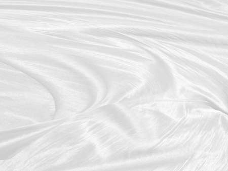 elegrance soft fabric white abstract smooth curve shape decorate fashion textile backgroundの写真素材