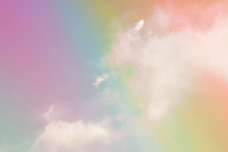 beauty sweet pastel yellow pink colorful with fluffy clouds on sky. multi color rainbow image....