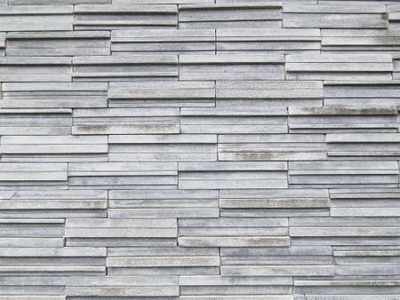 Luxury multi layer brick square shape gray color. strong brickwork wall outdoor house rock.の写真素材