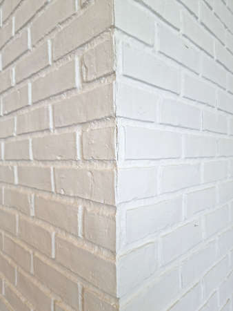 white square block brick vertical corner image. abstract cement wall design in house roomsの写真素材