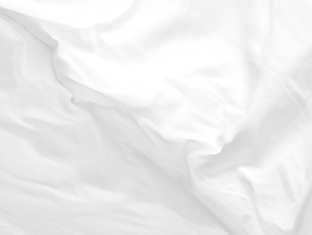 elegrance soft fabric white abstract smooth curve shape decorate fashion textile backgroundの写真素材