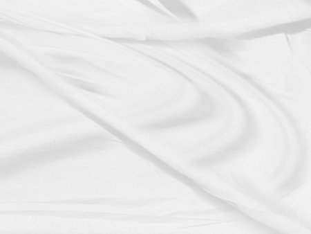 Clean woven fashion textile beautiful soft fabric abstract smooth curve shape decorative white backgroundの写真素材