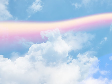 beauty abstract sweet pastel soft yellow and blue with fluffy clouds on sky. multi color rainbow...