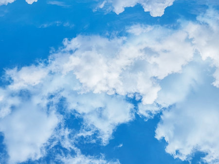 blue sky high shape outdoor group of white clouds background in summer abstract soft gradient light beauty background. beautiful bright cloud and calm fresh wind air climate.の写真素材
