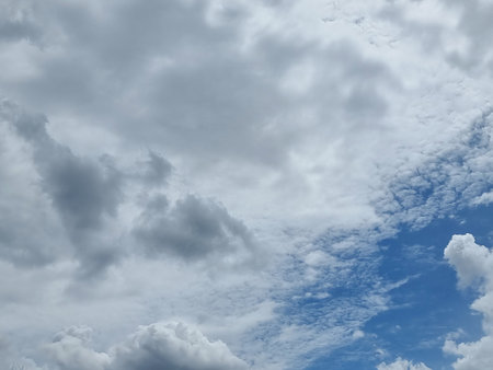 blue sky high abstract shape outdoor group of white and gray clouds background in summer gradient...