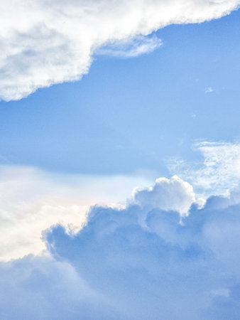 Vertical blue sky high shape outdoor group of white clouds background in summer gradient abstract light beauty background. beautiful bright cloud and calm fresh wind airの写真素材