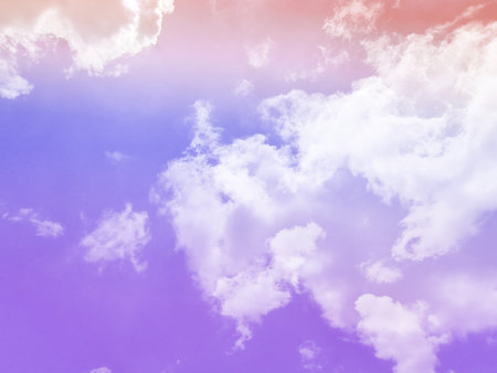 beauty sweet pastel purple and orange colorful with fluffy clouds on sky. multi color rainbow image. abstract fantasy growing lightの写真素材