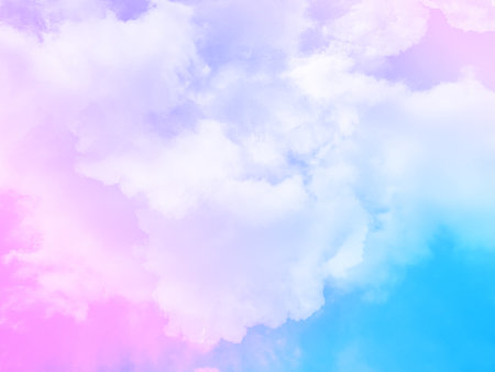 beauty sweet pastel pink and blue colorful with fluffy clouds on sky. multi color rainbow image. abstract fantasy growing lightの写真素材