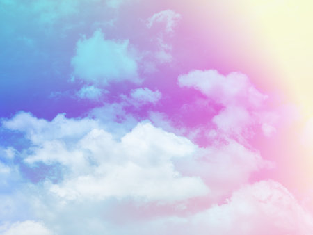 beauty sweet pastel green violet colorful with fluffy clouds on sky. multi color rainbow image. abstract fantasy growing lightの写真素材