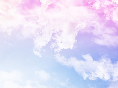 beauty sweet pastel blue and pink colorful with fluffy clouds on sky. multi color rainbow image. abstract fantasy growing lightの写真素材
