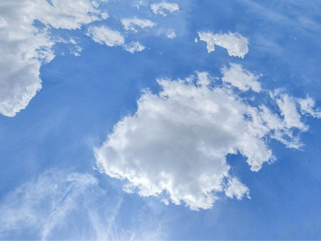 blue sky high abstract shape outdoor group of white clouds background in summer gradient light beauty background. beautiful bright cloud and calm fresh wind airの写真素材