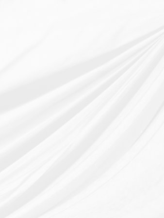 vertical clean smooth abstract fashion woven beautiful soft fabric curve shape decorative textile white backgroundの写真素材