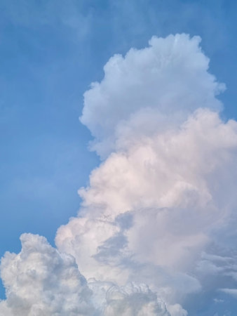 vertical blue sky high shape outdoor group of white clouds background in summer gradient light beauty background. beautiful bright abstract cloud and calm fresh wind airの写真素材